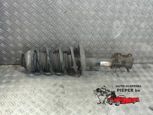 Used Front shock absorber rod, left Opel Corsa D 1.4 16V Twinport Price on request offered by Autosloperij Pieper BV