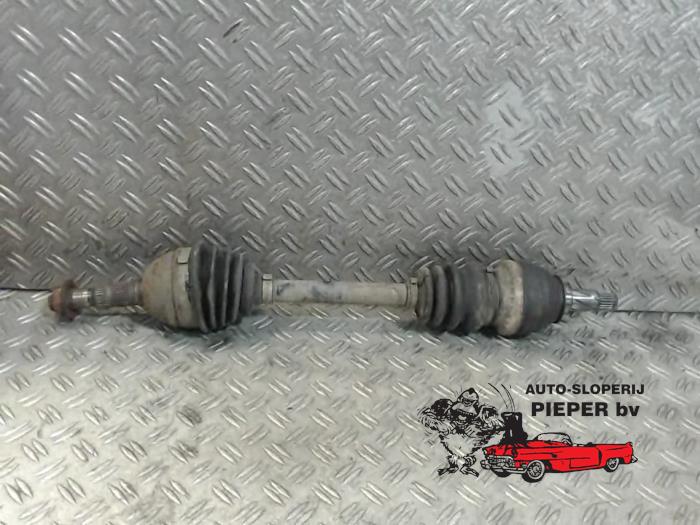 Front drive shaft, left from a Opel Zafira (M75) 1.6 16V 2008