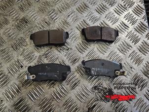 Used Front brake pad Suzuki Alto (RF410) 1.1 16V Price on request offered by Autosloperij Pieper BV