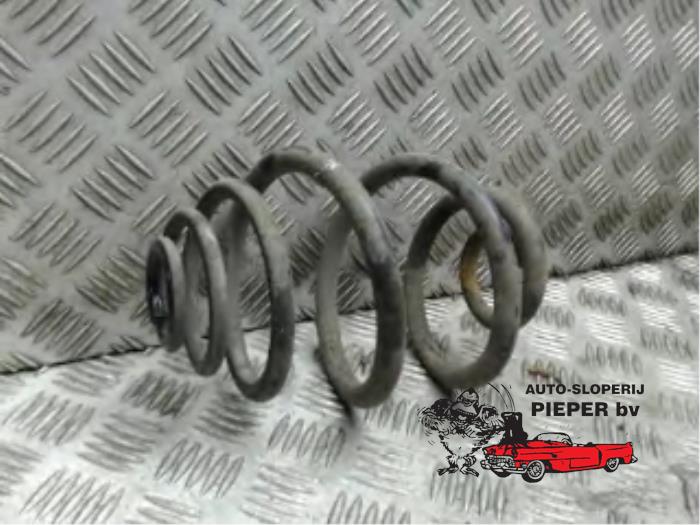 Rear coil spring from a Opel Corsa C (F08/68) 1.2 16V 2000