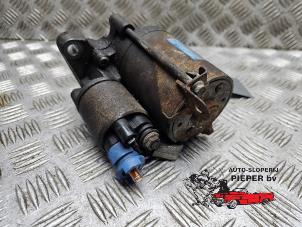 Anlasser van een Honda Stream I (RN) 1.7 16V VTEC 2001