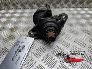 Anlasser van een Honda Stream I (RN) 1.7 16V VTEC 2001