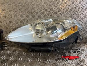 Used Headlight, left Fiat Bravo (198A) 1.4 16V Price on request offered by Autosloperij Pieper BV