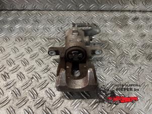 Used Rear brake calliper, left Renault Scénic I (JA) 1.8 16V Price on request offered by Autosloperij Pieper BV