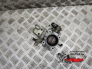 Drosselklappengehäuse van een Toyota Starlet (EP9) 1.3,XLi,GLi 16V 1998