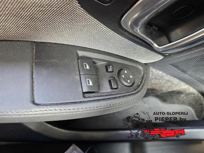 Usados Interruptor de ventanilla eléctrica BMW i3 (I01) i3s Precio € 47,25 Norma de margen ofrecido por Autosloperij Pieper BV