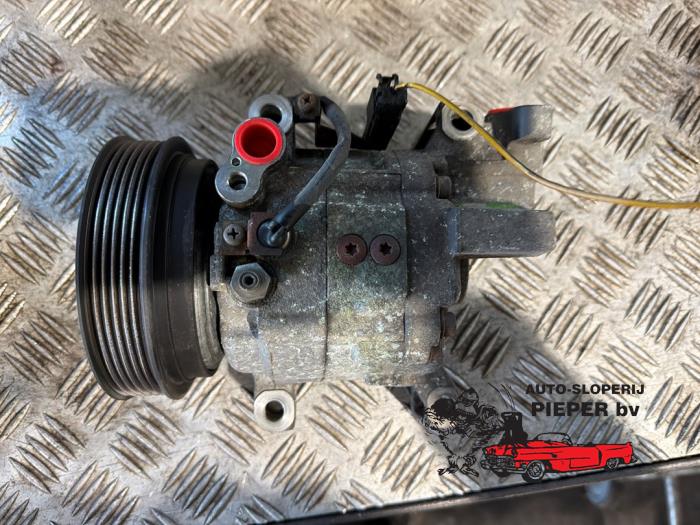 Usagé Pompe clim Nissan Micra (K11) 1.3 LX,SLX 16V Prix € 63,00 Règlement à la marge proposé par Autosloperij Pieper BV