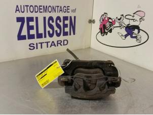 Used Front brake calliper, left Renault Megane III Coupe (DZ) 1.4 16V TCe 130 Price on request offered by Zelissen V.O.F. autodemontage