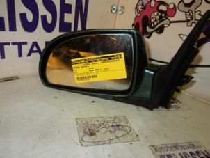 Used Wing mirror, left Kia Rio (DC22/24) 1.5 16V Price on request offered by Zelissen V.O.F. autodemontage