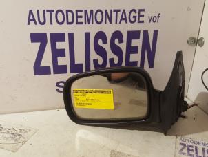 Usagé Rétroviseur gauche Kia Carens Prix sur demande proposé par Zelissen V.O.F. autodemontage