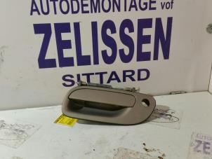 Used Door handle 4-door, front left Volvo XC70 (SZ) XC70 2.4 T 20V Price on request offered by Zelissen V.O.F. autodemontage