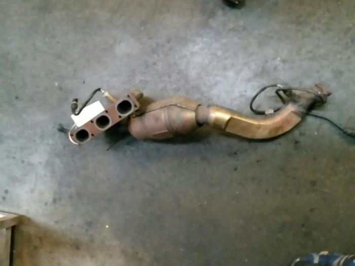 Catalytic converter from a BMW 3 serie (E46/4) 323i 24V 1999