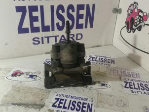 Used Rear brake calliper, left BMW 5 serie (E39) 528i 24V Price € 26,25 Margin scheme offered by Zelissen V.O.F. autodemontage