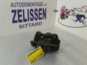 Usagé Etrier de frein avant gauche Renault Modus/Grand Modus (JP) 1.4 16V Prix € 31,50 Règlement à la marge proposé par Zelissen V.O.F. autodemontage