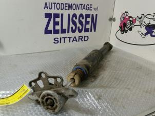 Used Rear shock absorber rod, right Opel Corsa Price € 26,25 Margin scheme offered by Zelissen V.O.F. autodemontage