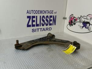 Używane Wahacz zawieszenia lewy przód Opel Corsa Cena na żądanie oferowane przez Zelissen V.O.F. autodemontage