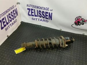 Used Rear shock absorber rod, left Toyota Corolla (E12) 1.6 16V VVT-i Price € 52,50 Margin scheme offered by Zelissen V.O.F. autodemontage