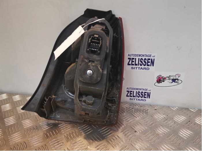 Taillight, left from a Renault Twingo II (CN) 1.2 16V 2008