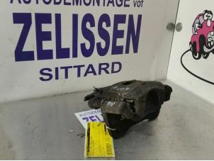 Used Front brake calliper, right Nissan Pixo (D31S) 1.0 12V Price € 26,25 Margin scheme offered by Zelissen V.O.F. autodemontage