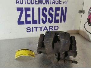 Used Front brake calliper, right Mitsubishi Colt (CJ) 1.3 GL,GLX 12V Price € 26,25 Margin scheme offered by Zelissen V.O.F. autodemontage