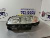 Headlight, left from a Renault Megane II Grandtour (KM) 1.9 dCi 120 2004