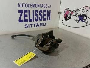 Used Rear brake calliper, left BMW X1 (E84) sDrive 18d 2.0 16V Price € 52,50 Margin scheme offered by Zelissen V.O.F. autodemontage