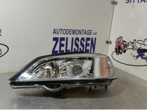 Używane Reflektor lewy Opel Astra G (F08/48) Cena € 42,00 Procedura marży oferowane przez Zelissen V.O.F. autodemontage