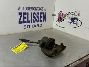 Used Front brake calliper, left Ford Focus 2 Wagon 1.6 16V Price € 36,75 Margin scheme offered by Zelissen V.O.F. autodemontage