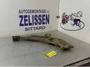 Usagé Bras de suspension avant gauche Toyota Starlet (EP8/NP8) 1.3 Friend,XLi 12V Prix € 47,25 Règlement à la marge proposé par Zelissen V.O.F. autodemontage