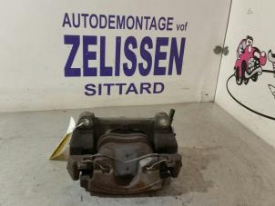 Used Front brake calliper, left Renault Laguna II (BG) 2.0 16V Price € 52,50 Margin scheme offered by Zelissen V.O.F. autodemontage