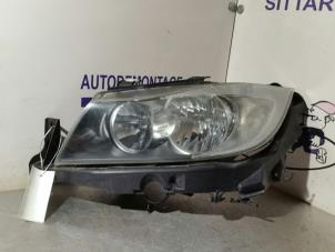 Used Headlight, left BMW 3 serie (E90) 318i 16V Price € 204,75 Margin scheme offered by Zelissen V.O.F. autodemontage