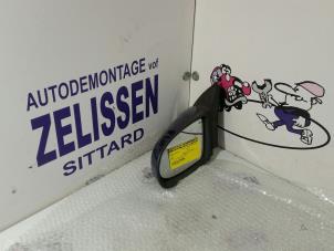 Used Wing mirror, left Opel Tigra (75) 1.6i 16V Price € 42,00 Margin scheme offered by Zelissen V.O.F. autodemontage