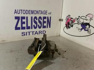 Used Front brake calliper, left BMW 3 serie (E90) 318i 16V Price € 52,50 Margin scheme offered by Zelissen V.O.F. autodemontage