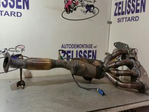 Used Exhaust manifold + catalyst Ford Focus C-Max 1.8 16V Flexifuel Price on request offered by Zelissen V.O.F. autodemontage