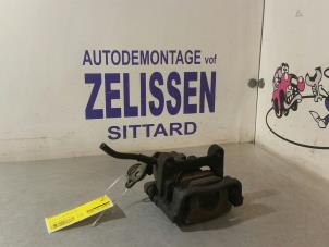 Usagé Etrier de frein (pince) arrière droit Ford Mondeo IV Wagon 2.0 16V Prix € 52,50 Règlement à la marge proposé par Zelissen V.O.F. autodemontage
