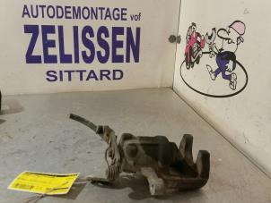 Used Rear brake calliper, left Volkswagen Golf VI (5K1) 2.0 TDI 16V Price € 52,50 Margin scheme offered by Zelissen V.O.F. autodemontage