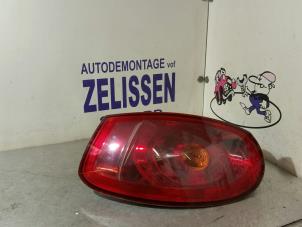 Used Taillight, left Fiat Bravo (198A) 1.4 16V Price € 42,00 Margin scheme offered by Zelissen V.O.F. autodemontage