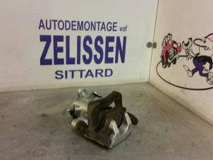 Used Rear brake calliper, right Volkswagen New Beetle (9C1/9G1) 2.0 Price € 36,75 Margin scheme offered by Zelissen V.O.F. autodemontage