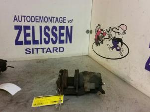 Used Front brake calliper, right Ford Focus Price € 26,25 Margin scheme offered by Zelissen V.O.F. autodemontage