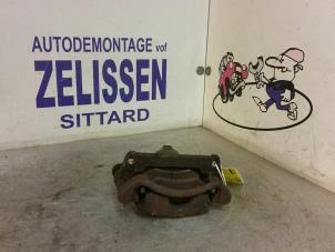 Used Front brake calliper, left Opel Agila (A) Price € 26,25 Margin scheme offered by Zelissen V.O.F. autodemontage