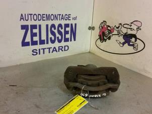 Used Front brake calliper, left Mazda Premacy 1.8 16V Price € 42,00 Margin scheme offered by Zelissen V.O.F. autodemontage