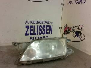 Used Headlight, left Mazda Premacy 1.8 16V Price € 31,50 Margin scheme offered by Zelissen V.O.F. autodemontage