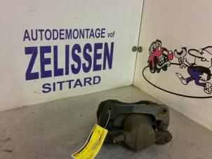 Used Front brake calliper, right Renault Scénic II (JM) 1.6 16V Price € 36,75 Margin scheme offered by Zelissen V.O.F. autodemontage