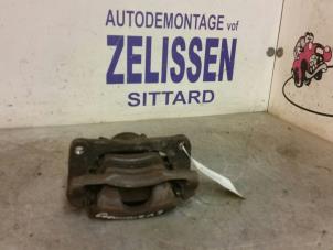 Used Front brake calliper, left Opel Agila (B) 1.2 16V Price € 42,00 Margin scheme offered by Zelissen V.O.F. autodemontage