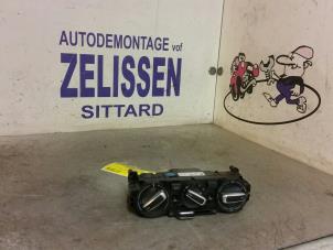 Usagé Panneau de commandes chauffage Seat Mii 1.0 12V Prix € 47,25 Règlement à la marge proposé par Zelissen V.O.F. autodemontage