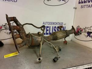 Used Exhaust manifold + catalyst Opel Combo (Corsa C) 1.3 CDTI 16V Price on request offered by Zelissen V.O.F. autodemontage