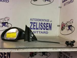 Używane Lusterko zewnetrzne lewe Seat Ibiza III (6L1) 1.4 16V 75 Cena € 42,00 Procedura marży oferowane przez Zelissen V.O.F. autodemontage