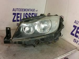 Used Headlight, left BMW 3 serie (E90) 318i 16V Price € 152,25 Margin scheme offered by Zelissen V.O.F. autodemontage