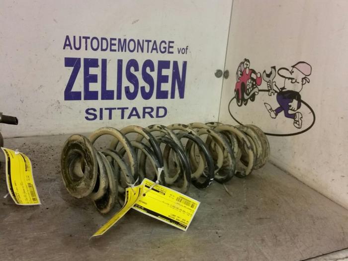 Rear coil spring from a Volkswagen Eos (1F7/F8) 2.0 TFSI 16V 2007