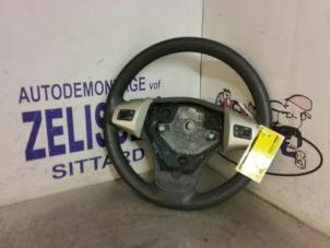 Used Steering wheel Opel Corsa D 1.4 16V Twinport Price € 42,00 Margin scheme offered by Zelissen V.O.F. autodemontage
